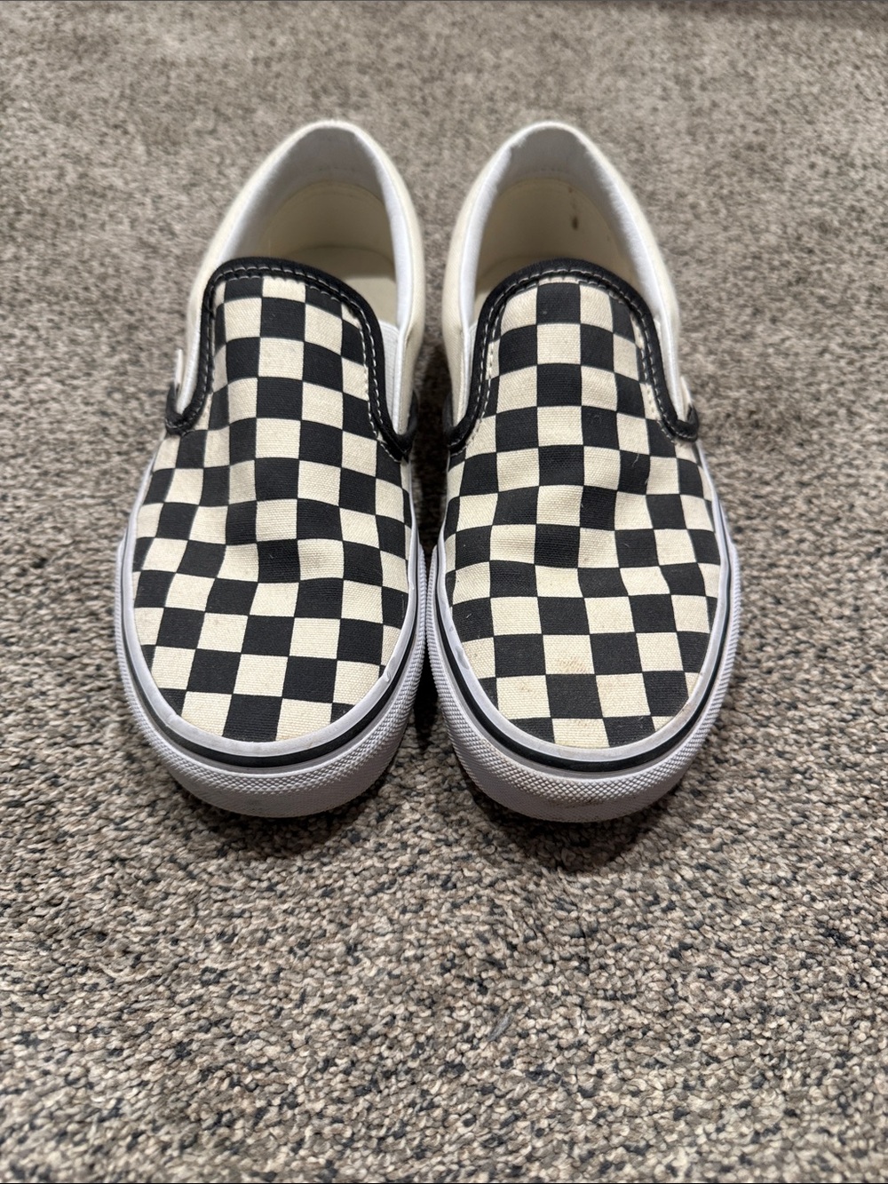 Vans Checkerboard Slip-On Sneakers in Black and White